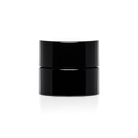 A small black childproof screw top glass jar.